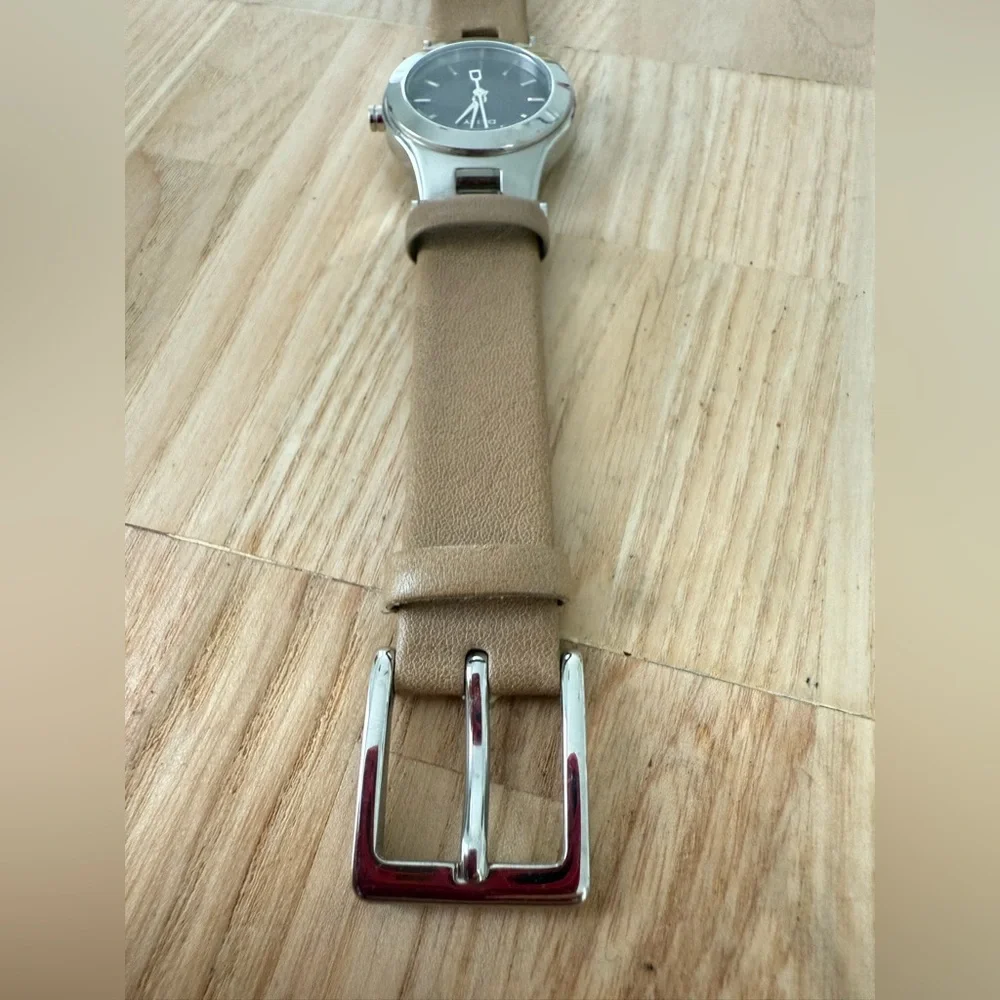 DKNY ladies silver tone tan leather dress watch NEW BATTERY